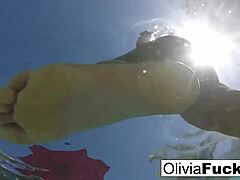 Olivia's bikini-clad pool playtime