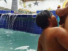 Indian mature and young Brazilian couple in the pool