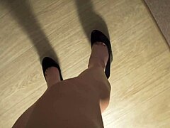 Muscular amateur milf teases with her long legs and foot fetish